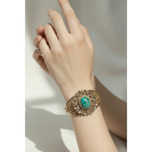 Load image into Gallery viewer, Gold Tone Filigree Cuff Bracelet Green Cabochon Statement Hinged Vintage